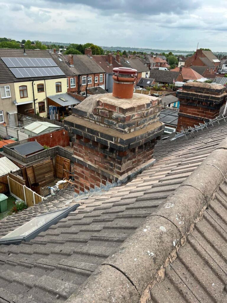 This is a photo taken from a roof which is being repaired by Greenhithe Roofing Repairs, it shows a street of houses, and their roofs